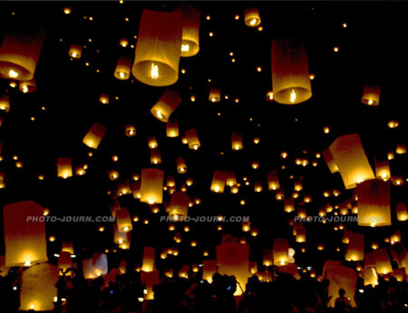 Floating "Khome Loi” (sky lanterns) fill the night sky