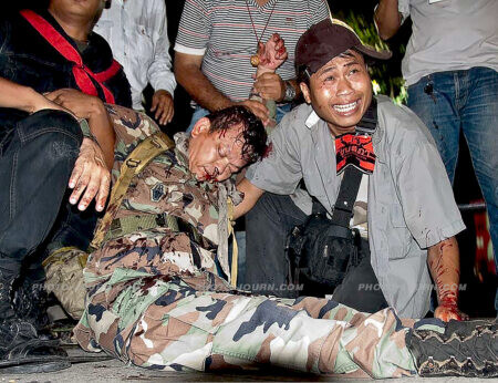Seh Daeng (เสธ แดง) was shot a split second after a video camera light illuminated his face 