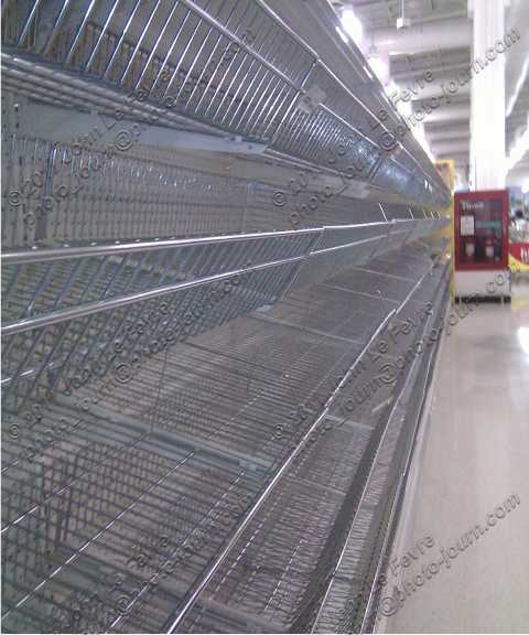 Empty supermarket shelves a result of the 2011 Thailand flood.