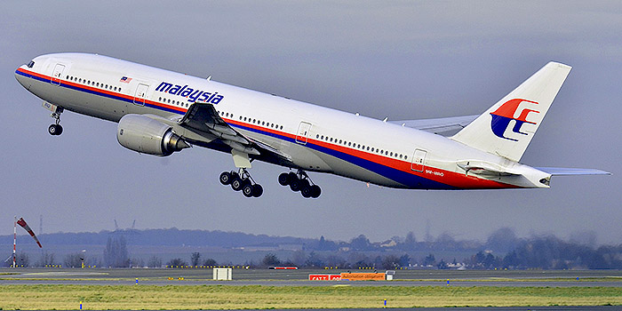 Malaysia Airlines Boeing 777-200ER (9M-MRO) which operated MH370 on March taking off at Roissy-Charles de Gaulle Airport (LFPG) in France. 26 December 2011