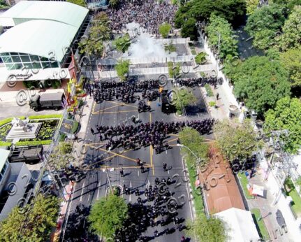 This photo from a camera drone captures tear gas exploding in front of anti-government protesters in Bangkok