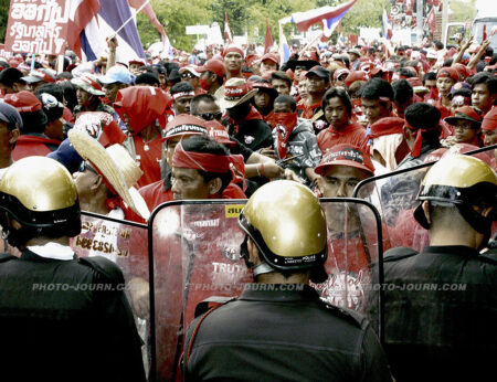 Thai police attempt to block pro-democracy protesters from reaching the residence of Privy Council President General Prem Tinsulanonda