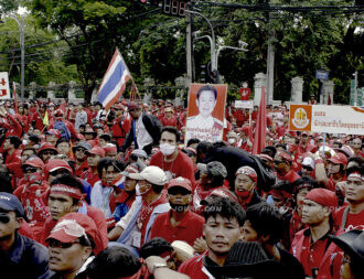 As dawn broke over Bangkok tens of thousands of pro-democracy protesters had already gathered at Government House.