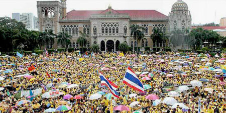 Thousands of anti-government protesters rally in the grounds of Bangkok's Government House