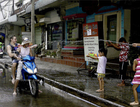 Water guns at three paces. A good drenching all part of the Thailand Songkran festival madness