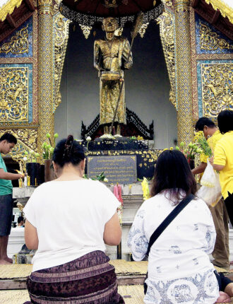 Many Thai people will visit a temple (Watt) during the Songkran period to make merit.
