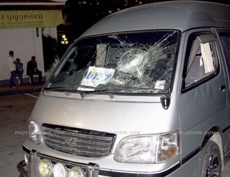 One of the vehicles carrying government officers that was attacked by Patpong night market traders.