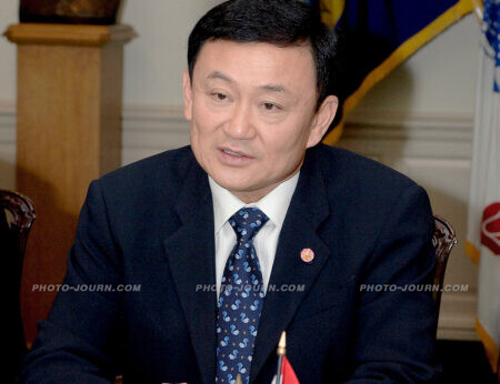 Former Thailand prime minister Thaksin Shinawatra currently in exile and stripped of his Thai passports.