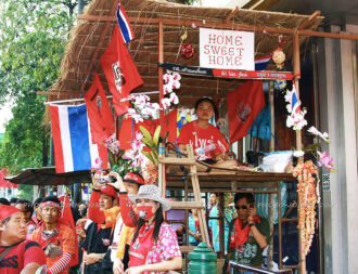 This red-shirt protester demonstrated her willingness for a protracted stay by erecting a bamboo house in the heart of the Bangkok shopping and business district